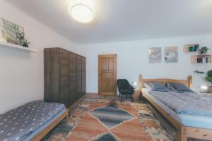 Postel nebo postele na pokoji v ubytování Chalupa Šulcovna