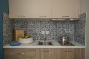 Kuchyň nebo kuchyňský kout v ubytování Athina Residence + 37 fotografií