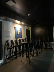 a conference room with a long table and chairs at 365 Homestay in Kaki Bukit +33 photos