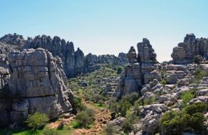 a view of a rocky mountain with trees and rocks at CASA JARO in Sierra de Yeguas