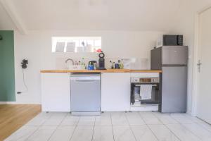 Kuchyň nebo kuchyňský kout v ubytování Appartement Familial - Avec Parking Privé Gratuit