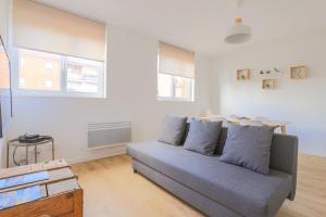 Posezení v ubytování Appartement Familial - Avec Parking Privé Gratuit