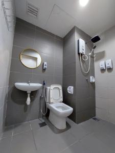 a bathroom with a shower and a toilet and a sink at 3 Elements* The Garden* MRT2* Wifi* Self Check-In in Kampong Batu Sembilan