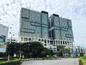 a large building with a lot of windows at 3 Elements* The Garden* MRT2* Wifi* Self Check-In in Kampong Batu Sembilan