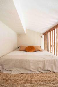 Appartement climatisé en plein centre avec balcon tesisinde bir odada yatak veya yataklar