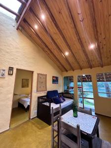 Postel nebo postele na pokoji v ubytování Casa Apu Honey Moon Suite Pague duas noites minimo e a terceira e brinde menos feriados