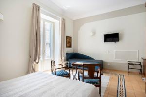 TV a/nebo společenská místnost v ubytování Rosa Magra Guest House
