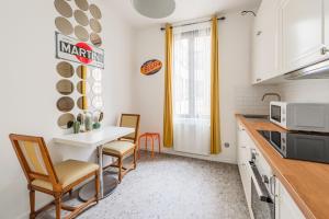 Kuchyň nebo kuchyňský kout v ubytování Magnifique 42m carré Centre Ville
