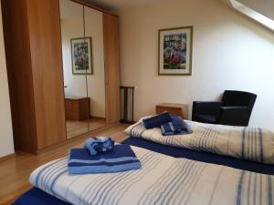 Postel nebo postele na pokoji v ubytování Ferienhaus Jantje Moe 3 + 6 fotografií