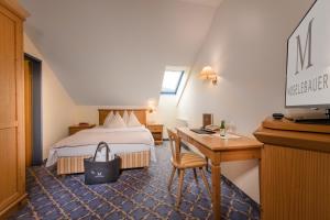 Voodi või voodid majutusasutuse Hotel Moselebauer toas