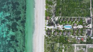 an aerial view of a resort and the beach at Sensations Eco-Chic Hotel in Pwani Mchangani Mdogo