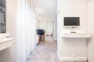 TV a/nebo společenská místnost v ubytování Art Hotel