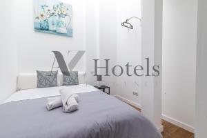 Letto o letti in una camera di AYZ Luis Cabrera-Auto check-in property