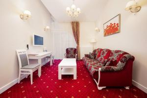 TV a/nebo společenská místnost v ubytování Art Hotel