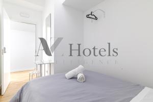 Letto o letti in una camera di AYZ Luis Cabrera-Auto check-in property