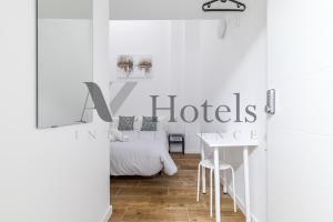 Letto o letti in una camera di AYZ Luis Cabrera-Auto check-in property