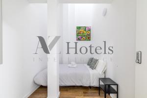 Letto o letti in una camera di AYZ Luis Cabrera-Auto check-in property