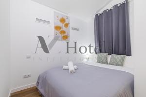 Letto o letti in una camera di AYZ Luis Cabrera-Auto check-in property