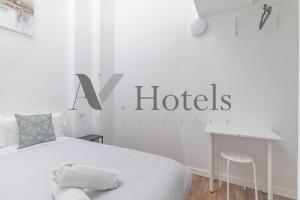 Letto o letti in una camera di AYZ Luis Cabrera-Auto check-in property