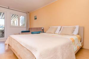 Posteľ alebo postele v izbe v ubytovaní Apartments Edita