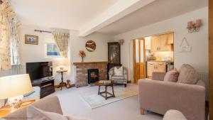 Istumisnurk majutusasutuses Picturesque Stone Cottage in the Heart of North Yorkshire Village - Hideaway Cottage