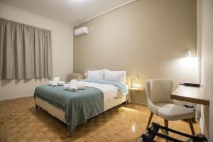 Kama o mga kama sa kuwarto sa V Hotel Delphi