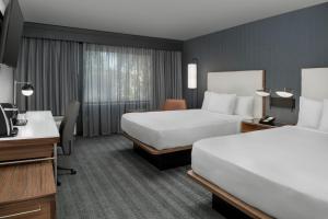 Postel nebo postele na pokoji v ubytování Courtyard by Marriott San Diego Carlsbad