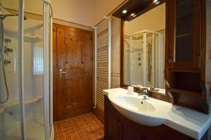 a bathroom with a sink and a shower at Casa Dolores in Padola +11 photos