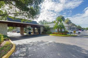 a parking lot in front of a hotel at Park Shore Resort, 1st Floor, Bldg. A in Naples