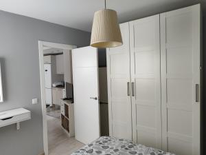 Posteľ alebo postele v izbe v ubytovaní apartment in Seville city centre + 5 fotografií