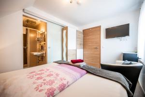 Postel nebo postele na pokoji v ubytování Die Schlafstube - Bed & Breakfast