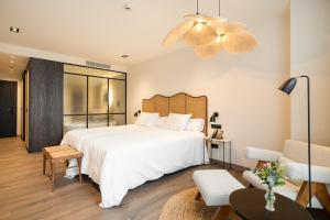 Cama o camas de una habitación en Sercotel EsteOeste