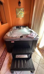 a jacuzzi tub in a corner of a bathroom at Luxe apartment / Prime location / 2 bedr- 2.5 bathrooms in Marrakech