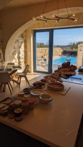 a bunch of food on a counter in a room at Sea Holly Gozo in Nadur