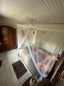 Letto o letti in una camera di Kay Jean Au Diamant