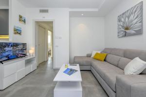 Posezení v ubytování New Apartment Lazise
