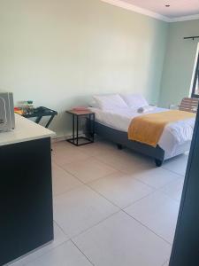 TrendyBliss Guest House客房内的一张或多张床位
