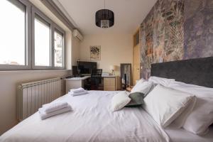 Кровать или кровати в номере La Maison Panoramique Belgrade