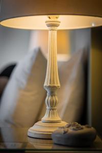 a close up of a lamp on a table at MARON ΙΙ με τζάκι in Kalavrita