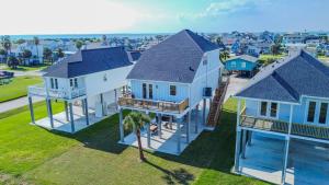 an aerial view of a house at Galveston Beach House w Water Views & New Pool in Galveston