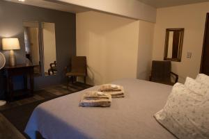 Voodi või voodid majutusasutuse Hawaii Island Resort toas