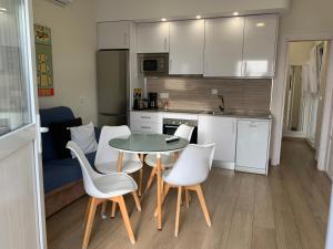 Kuchyň nebo kuchyňský kout v ubytování Apartamento La Vasca + 21 fotografií