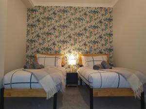 Katil atau katil-katil dalam bilik di Clarence House