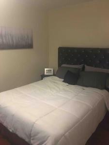 Postel nebo postele na pokoji v ubytování The luxury lounge + 12 fotografií