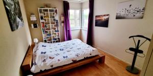 Postel nebo postele na pokoji v ubytování Appartement avec terrasse