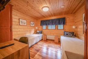 Ein Bett oder Betten in einem Zimmer der Unterkunft Levi President