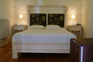 Ένα ή περισσότερα κρεβάτια σε δωμάτιο στο Hotel Rural Villa Julia