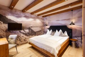 Postel nebo postele na pokoji v ubytování Landhotel Schermer
