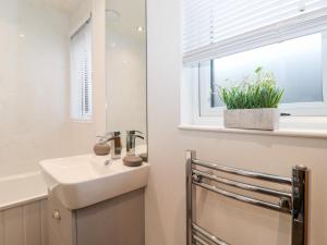 Koupelna v ubytování Bowness Bay Lodge + 26 fotografií