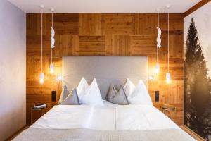 Postel nebo postele na pokoji v ubytování Landhotel Schermer
